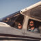 photo of couple in aircraft