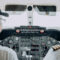 two pilots in cockpit flying