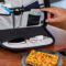 Pilot flight bag and energy squares visible on table at airport