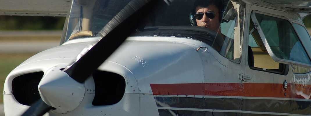 Close up of pilot seen in Cessna 172 Aircraft