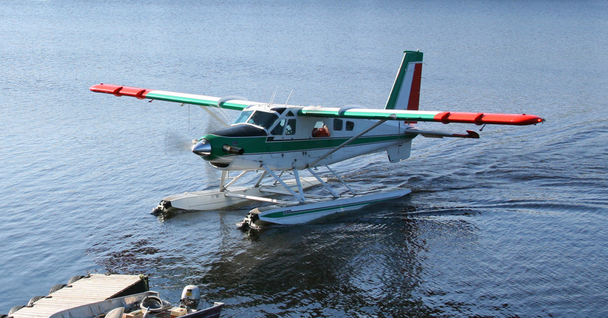 seaplane skimming on blue waters