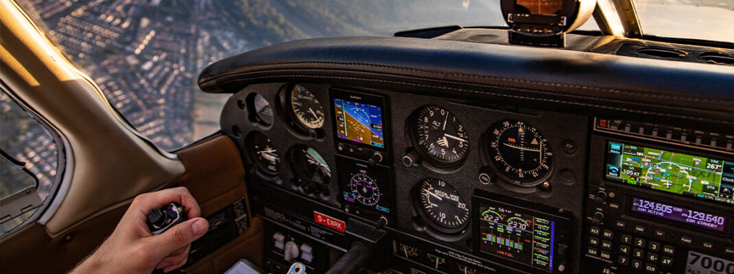 piloting an aircraft from one geographic position to another while monitoring one’s position as the flight progresses