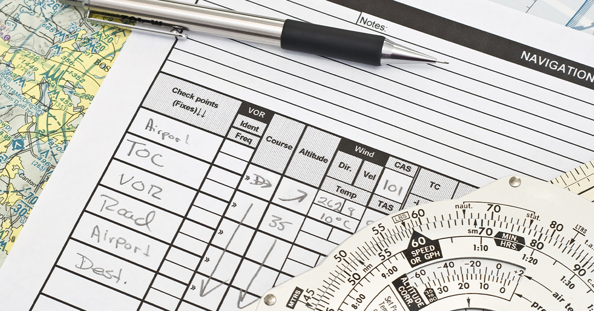 A navigation log and an E6B flight computer