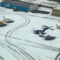 Winter weather at small airfield with tracks visible in snow