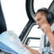 pilot talking into headset while holding aeronautical chart