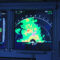 Close up shot on the weather radar on the Navigation Display screen of an Airbus, visible returns