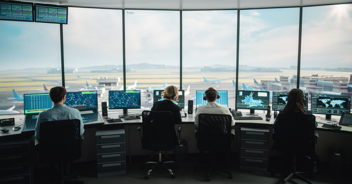 Air Traffic Control Team Working in a Modern Airport Tower