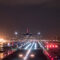 airplane landing at night with runway lights prominent