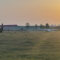 Morning dew on the aerodrome with small aircraft at dawn