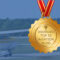 Top 50 award medal depicted atop image of Cessna 172 taxiing out to the runway