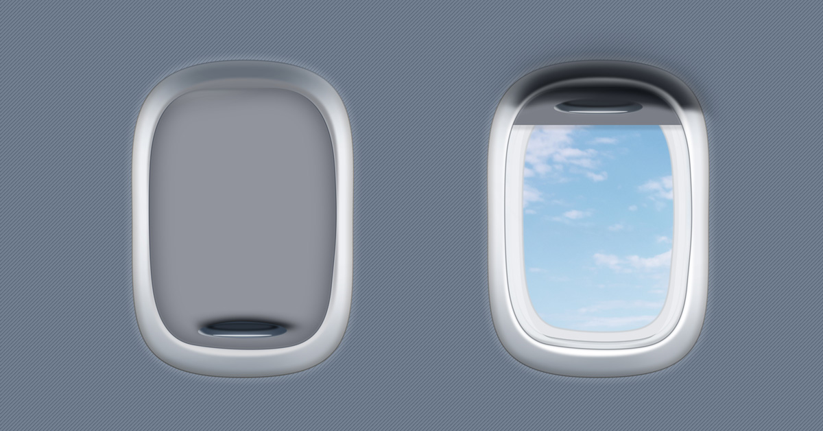 two airplane window one closed and one open