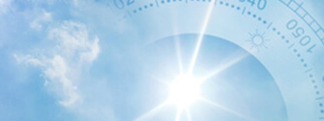 Barometer over blue sunny sky