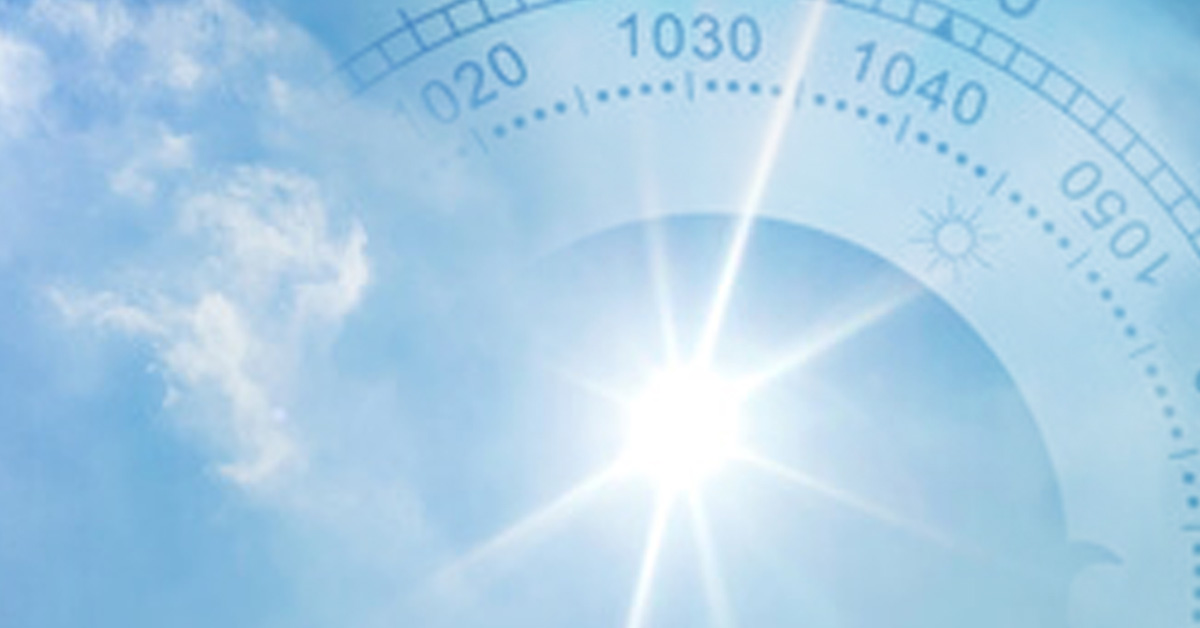 Barometer over blue sunny sky