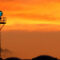 Rotating beacon at airport during sunset