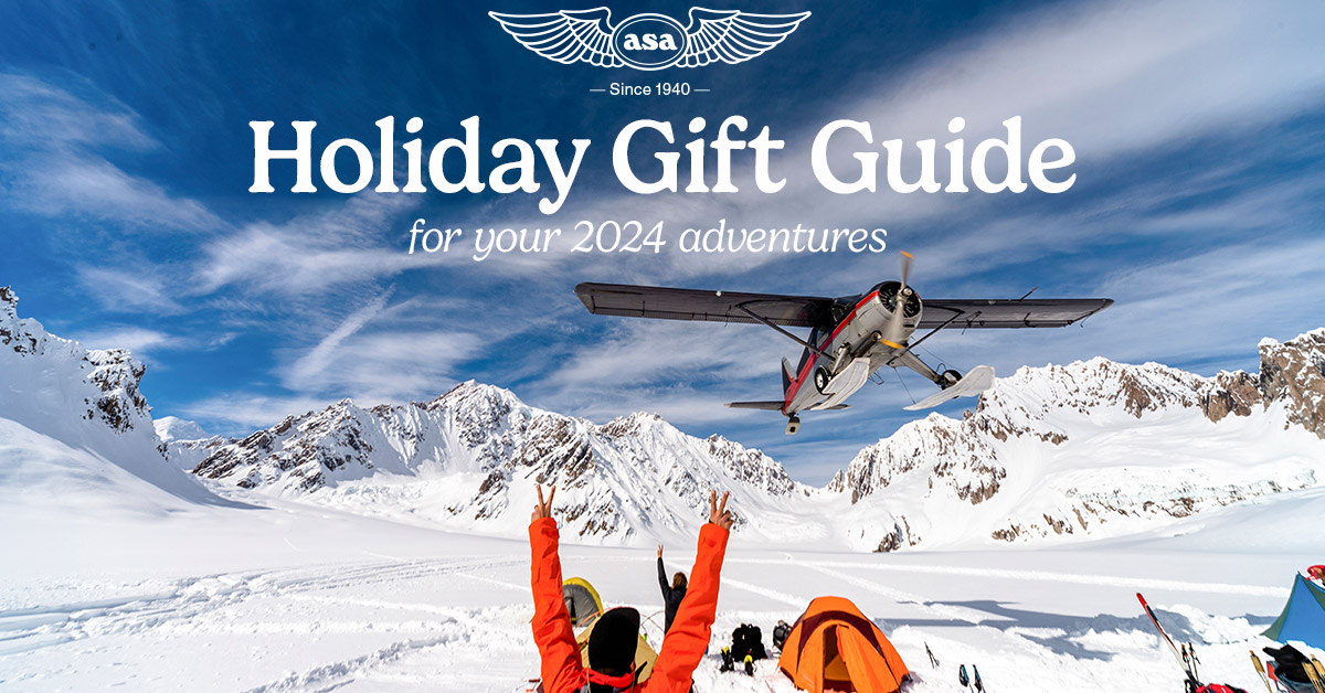 A plane flying over snow covered mountains and winter campers, with ASA logo and Holiday Gift Guide text.