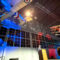 2025 NIFA SAFECON award ceremony with airplanes on ceiling and colored lights in background.